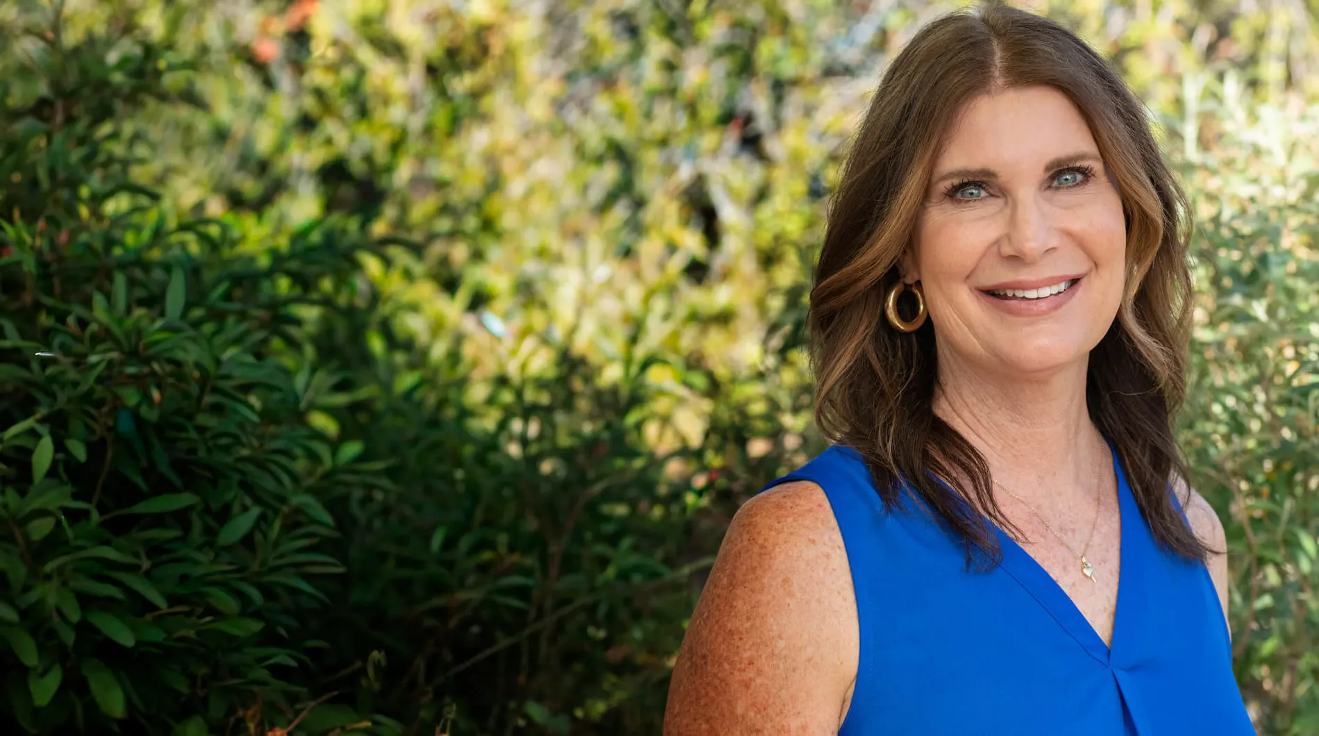 Amanda Gelatt, founder of A Senior Journey, smiling outdoors in Tucson